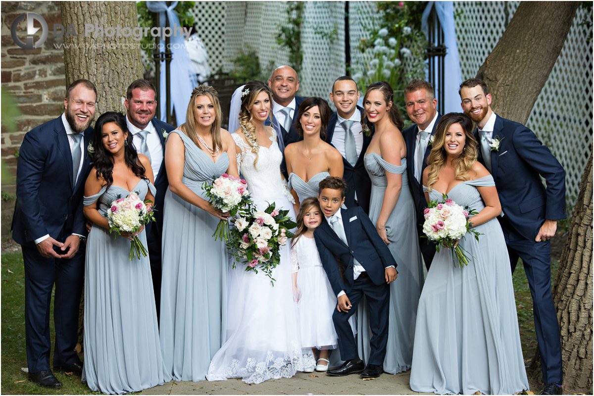 wedding party and their floral arrangements