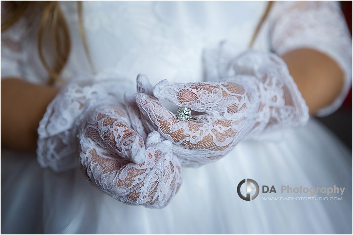 diamond ring in the flower girl’s hands